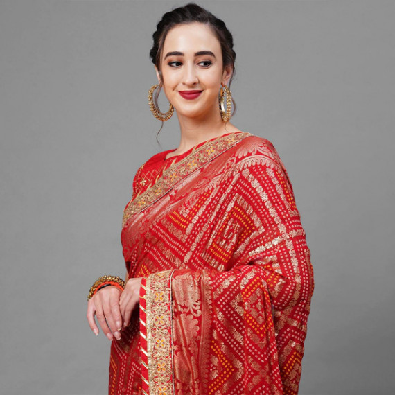 https://zestystyles.in/products/red-gold-toned-woven-design-bandhani-saree